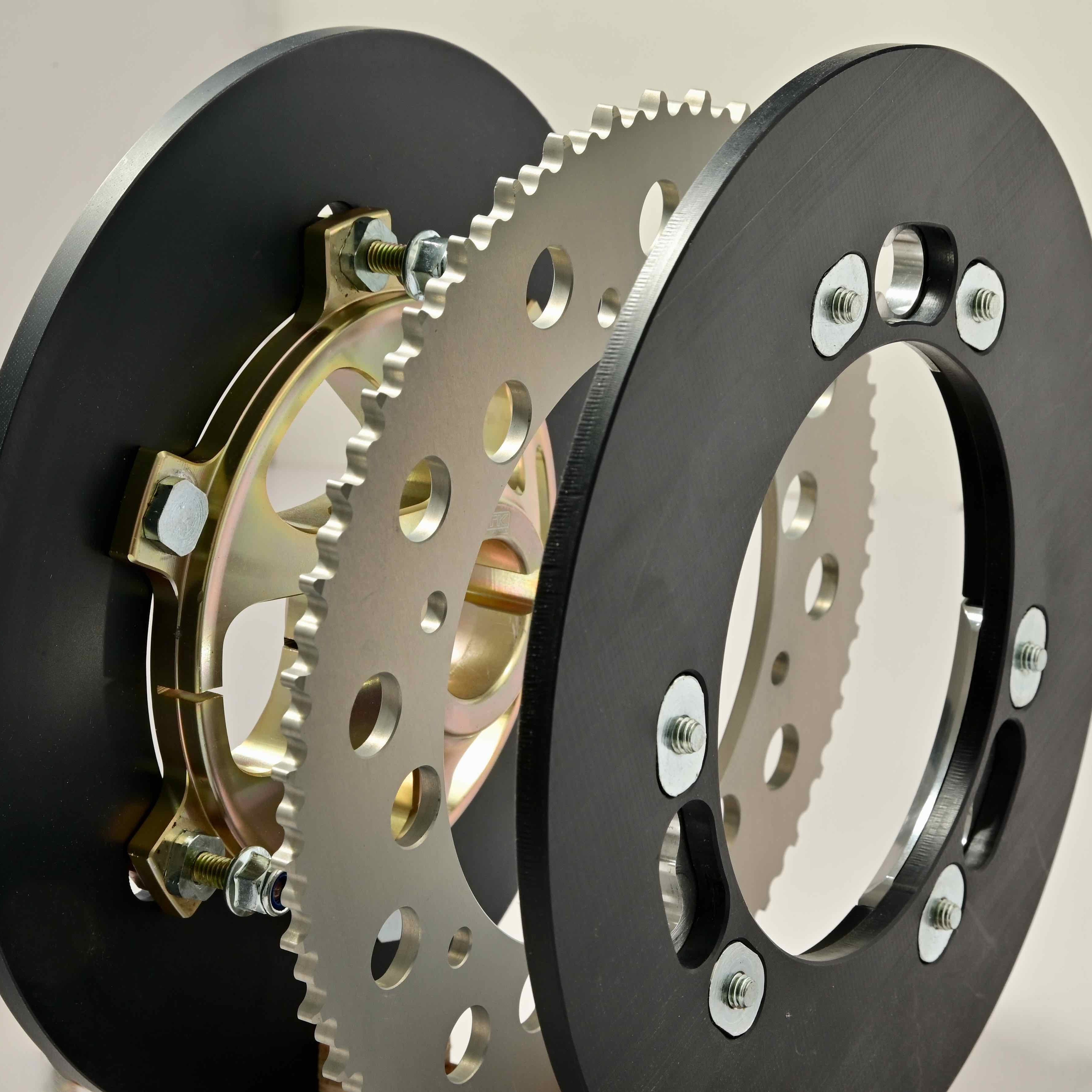 Close up of go kart sprocket between two protectors