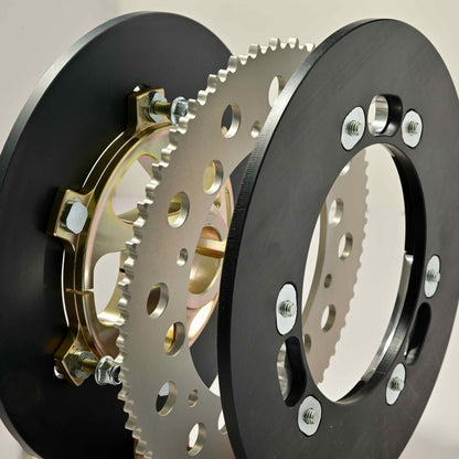 Close up of go kart sprocket between two protectors